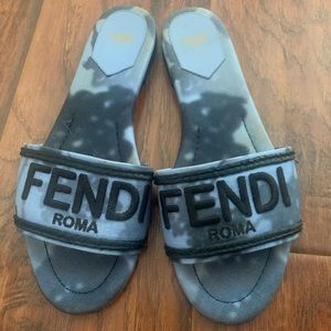 Fendi slides , no box or shoe bag .